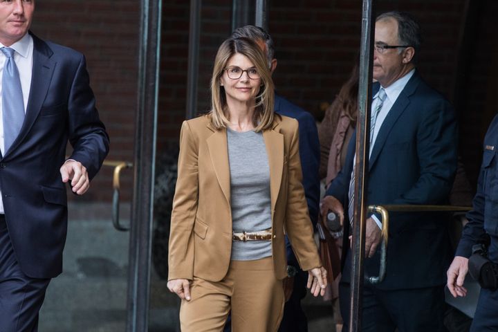 Actress Lori Loughlin exits federal court in Boston on April 3.