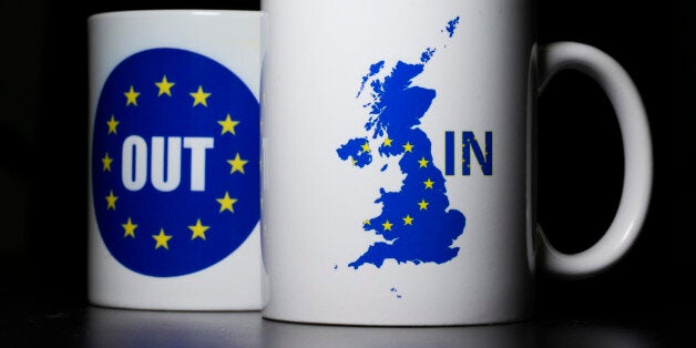 LONDON, UNITED KINGDOM - MARCH 17: In this photo illustration, the words 'IN' and 'OUT' are depicted on mugs on March 17, 2016 in London, United Kingdom. The United Kingdom will hold a referendum on June 23, 2016 to decide whether or not to remain a member of the European Union (EU), an economic and political partnership involving 28 European countries which allows members to trade together in a single market and free movement across its borders for citizens. (Photo by Dan Kitwood/Getty Images)