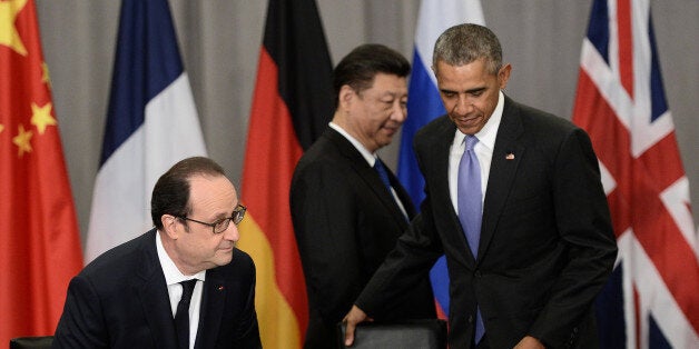 French President Francois Hollande (L), China's President Xi Jinping (C) and US President Barack Obama (R) arrive to take part in a P5+1 meeting during the Nuclear Security Summit at the Walter E. Washington Convention Center on April 1, 2016 in Washington, DC. / AFP / STEPHANE DE SAKUTIN (Photo credit should read STEPHANE DE SAKUTIN/AFP/Getty Images)