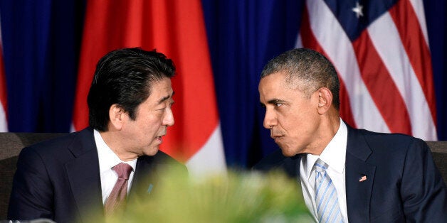 U.S. President Barack Obama, right, and Japanâs Prime Minister Shinzo Abe, left, talk during a bilateral meeting at the Asia-Pacific Economic Cooperation summit in Manila, Philippines, Thursday, Nov. 19, 2015. (AP Photo/Susan Walsh)