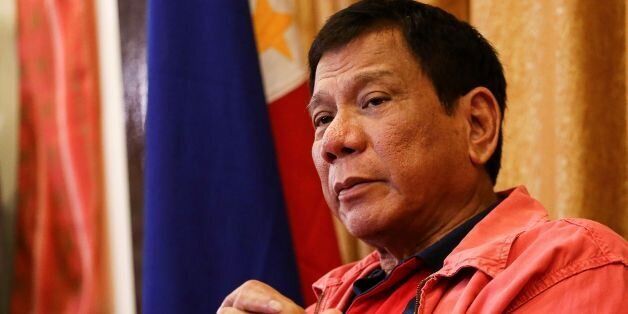 Philippines' president-elect Rodrigo Duterte speaks during a press conference in Davao City, in southern island of Mindanao on May 26, 2016. Explosive incoming Philippine president Rodrigo Duterte has launched a series of obscenity-filled attacks on the Catholic Church, branding local bishops corrupt 'sons of whores' who are to be blamed for the nation's fast-growing population. / AFP / MANMAN DEJETO (Photo credit should read MANMAN DEJETO/AFP/Getty Images)