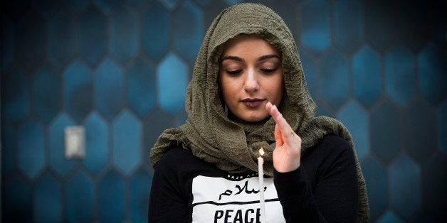 LOS ANGELES, CALIF. -- MONDAY, JUNE 13, 2016: Marwa Balkar holds a candle at the Islamic Center of Southern California and I