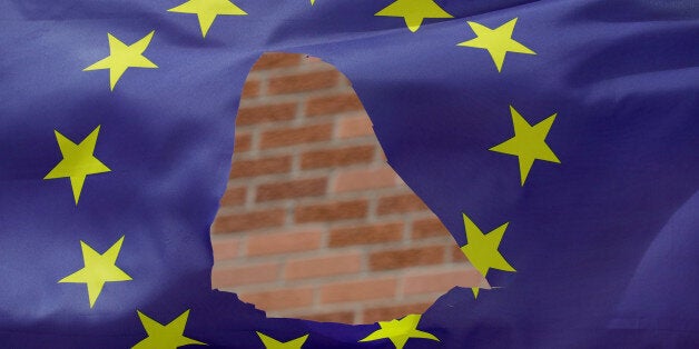 KNUTSFORD, UNITED KINGDOM - JUNE 24: A European Union flag, with a hole cut in the middle, flies at half-mast outside a home