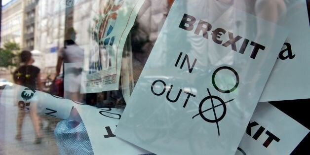 A poster featuring a Brexit vote ballot with 'out' tagged is on display at a book shop window in Berlin on June 24, 2016.