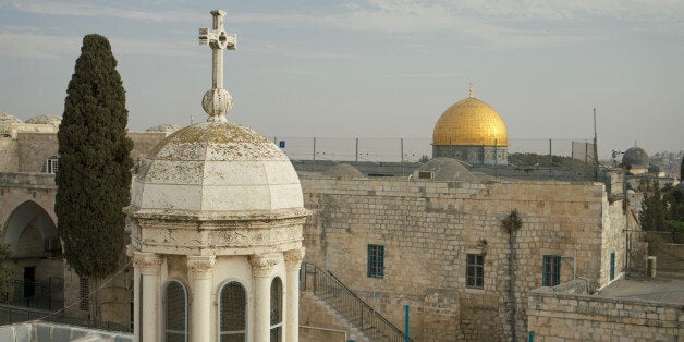 Jerusalem - Mosque Dome of the Rock and Cross Franciscan Dome, Islamic in front of Christianity.