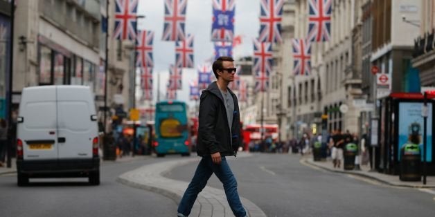 Union flags are attached between buildings along Oxford street in central london on June 27, 2016.
Shares in banks, airlines