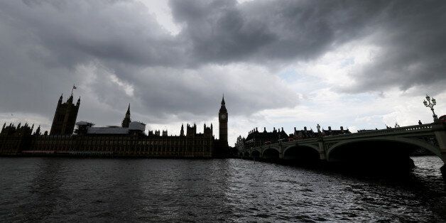 The Houses of Parliament from across the river Thames with Westminster Bridge, right, following yesterday's EU referendum result, London, Saturday, June 25, 2016. Britain voted to leave the European Union after a bitterly divisive referendum campaign. (AP Photo/Tim Ireland)