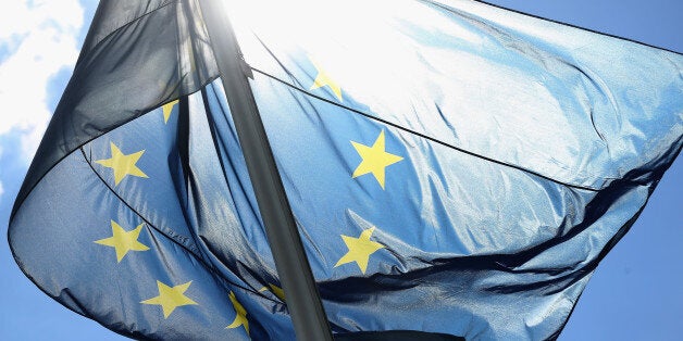 BERLIN, GERMANY - JUNE 27: The flag of the European Union flies at the Chancellery on June 27, 2016 in Berlin, Germany. German Chancellor Angela Merkel is scheduled to receive French President Francois Hollande, Italian Prime Minister Matteo Renzi and European Council President Donald Tusk today to discuss the consequences of last week's Brexit vote. (Photo by Sean Gallup/Getty Images)