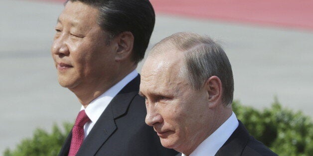 BEIJING, CHINA - JUNE 25, 2016: China's President Xi Jinping (L) and Russian President Vladimir Putin at a welcoming ceremony. Mikhail Metzel/TASS (Photo by Mikhail Metzel\TASS via Getty Images)