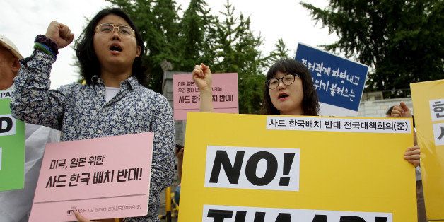 SEOUL, SOUTH KOREA - JULY 13: Protesters attend the rally to denounce deploying the Terminal High-Altitude Area Defense (THAAD) in front of the Defense Ministry on July 13, 2016 in Seoul, South Korea. South Korea's defense ministry announced on July 13, 2016 to deploy a U.S. military's THAAD anti-missile defense unit in Seongju county amid the escalating tension with the neighboring China and North Korea. (Photo by Chung Sung-Jun/Getty Images)