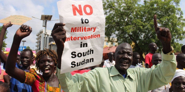 Hundreds of South Sudanese protest in Juba, South Sudan against Foreign military intervention Wednesday July 20, 2016 (AP Photo/Samir Bol)