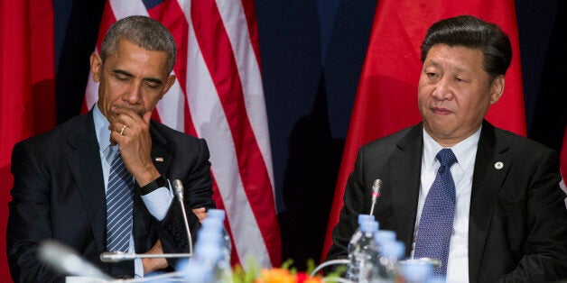 U.S. President Barack Obama, left, meets with Chinese President Xi Jinping during their meeting held on the sidelines of the