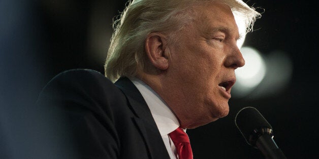 ERIE, PA - AUGUST 12: Republican presidential candidate Donald Trump speaks to supporters at a rally at Erie Insurance Arena on August 12, 2016 in Erie, Pennsylvania. Trump continues to campaign for his run for president of the United States. (Photo by Jeff Swensen/Getty Images)