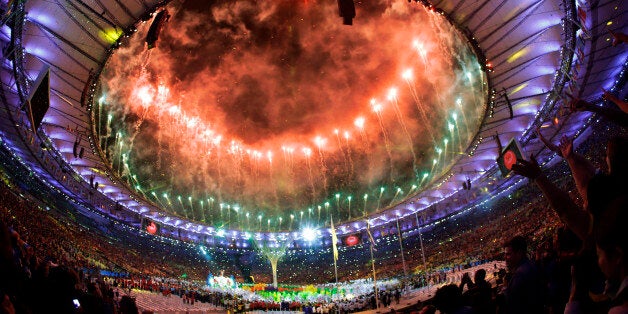 Pyrotechnics erupt during the closing ceremony in the Maracana stadium at the 2016 Summer Olympics in Rio de Janeiro, Brazil, Sunday, Aug. 21, 2016. (AP Photo/Mark Humphrey)