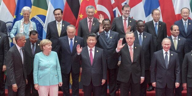 HANGZHOU, CHINA SEPTEMBER 4, 2016: US President Barack Obama, Germany's Chancellor Angela Merkel, China's President Xi Jinping, Turkey's President Recep Tayyip Erdogan, Russia's President Vladimir Putin, France's President Francois Hollande (L-R 1st row), Japan's Prime Minister Shinzo Abe, Egypt's President Abdel Fattah el-Sisi (R-L 2nd row), International Monetary Fund Managing Director Christine Lagarde (L third row), Spain's Acting Prime Minister Mariano Rajoy (4th L third row), and United Nations Secretary General Ban Ki-moon (2nd R third row) pose for a family photo at the G20 summit in Hangzhou. Sergei Guneyev/Russian Presidential Press and Information Office/TASS (Photo by Sergei Guneyev\TASS via Getty Images)