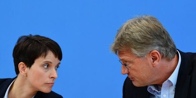Leaders of the Alternative fuer Deutschland (AfD) Frauke Petry (L) and Joerg Meuthen attend a press conference one day after