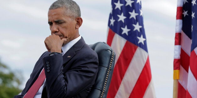 U.S. President Barack Obama waits to speak during a ceremony marking the 15th anniversary of the 9/11 attacks at the Pentagon in Washington, U.S., September 11, 2016. REUTERS/Joshua Roberts TPX IMAGES OF THE DAY 