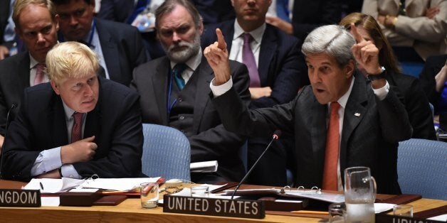 Boris Johnson(L), UK foreign secretary looks on as US Secretary of State John Kerry speaks during a Security Council Meeting September 21, 2016 on the situation in Syria at the United Nations in New York.The UN Security Council met Wednesday for crisis talks on Syria as air raids shook Aleppo and diplomatic tensions ran high over an attack on an aid convoy. / AFP / TIMOTHY A. CLARY (Photo credit should read TIMOTHY A. CLARY/AFP/Getty Images)