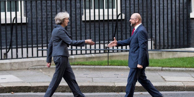 TOPSHOT - British Prime Minister Theresa May (L) greets President of the European Parliament Martin Schulz (R) outside 10 Downing Street in London on September 22, 2016. / AFP / JUSTIN TALLIS (Photo credit should read JUSTIN TALLIS/AFP/Getty Images)