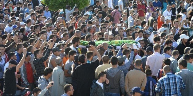 RABAT, MOROCCO - OCTOBER 30: Moroccan people stage a protest after a fisherman Mohcine Fikri, crushed to death in a garbage t