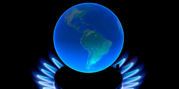 Earth globe with flames, symbol for global warming, climate change