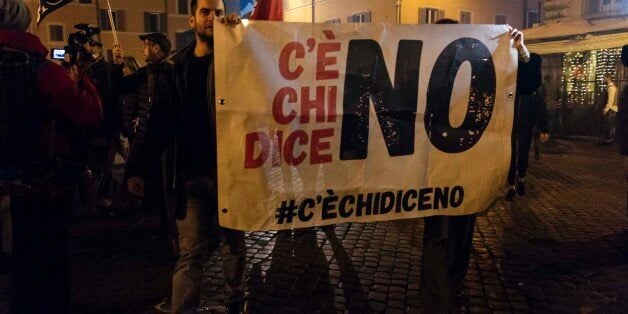 People take to the streets in Rome, Italy, on 5 December 2016 after the results of the italian constitutional referendum to celebrate the victory of the NO front. (Photo by Jacopo Landi/NurPhoto via Getty Images)