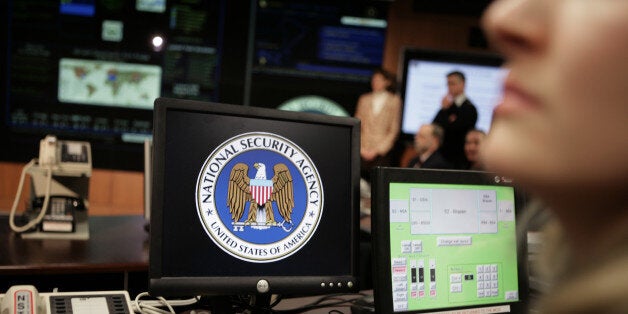 The National Security Agency (NSA) logo is shown on a computer screen inside the Threat Operations Center at the NSA in Fort Meade. U.S. President George W. Bush visited the ultra-secret National Security Agency on Wednesday to underscore the importance of his controversial order authorizing domestic surveillance without warrants. (Photo by Brooks Kraft LLC/Corbis via Getty Images)