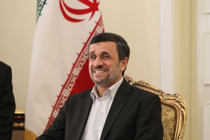 Iran's President Mahmoud Ahmadinejad smiles as he meets his Pakistanese counterpart during a meeting on February 27, 2013 in the Iranian capital Tehran. Pakistan's president arrived in Tehran for discussions on a much-delayed $7.5 billion gas pipeline project which is opposed by the United States, Iranian media reported. AFP PHOTO/ATTA KENARE (Photo credit should read ATTA KENARE/AFP/Getty Images)