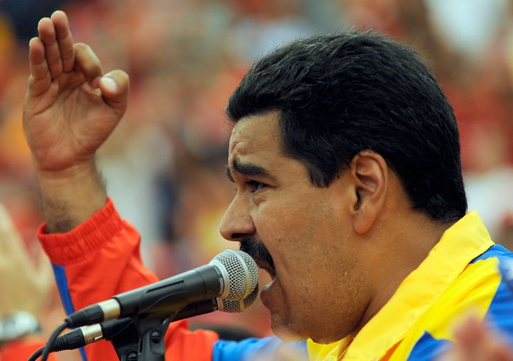 Venezuelan acting president Nicolas Maduro delivers a speech during a campaign rally in the state of Barinas, Venezuela on March 30, 2013, ahead of the presidential election on April 14. AFP PHOTO/JUAN BARRETO (Photo credit should read JUAN BARRETO/AFP/Getty Images)