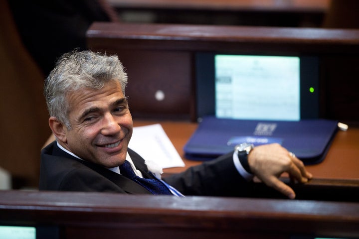 JERUSALEM, ISRAEL - FEBRUARY 05: Yair Lapid leader of the Israeli Yesh Atid party attends the swearing-in ceremony of the 19t