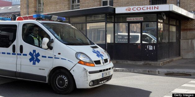 An ambulance leaves the Cochin hospital on April 2, 2012 in Paris. AFP PHOTO KENZO TRIBOUILLARD (Photo credit should read KENZO TRIBOUILLARD/AFP/Getty Images)