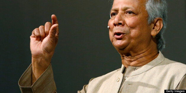 Bangladeshi Nobel Peace Prize winner and microcredit pioneer Muhammad Yunus delivers a speech during the 4th edition of the Global Social Business Summit, held at the Austria Center, in Vienna, on November 8, 2012. 'This summit is a kind of breath of fresh air. All the gloom and doom in the world, we want to get out of that,' Yunus, 72, said at the three-day event in Vienna. AFP PHOTO / ALEXANDER KLEIN (Photo credit should read ALEXANDER KLEIN/AFP/Getty Images)