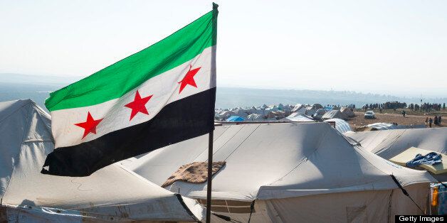 Free Syrian flag flying inside Atimah (Qatma) refugee camp, Syria