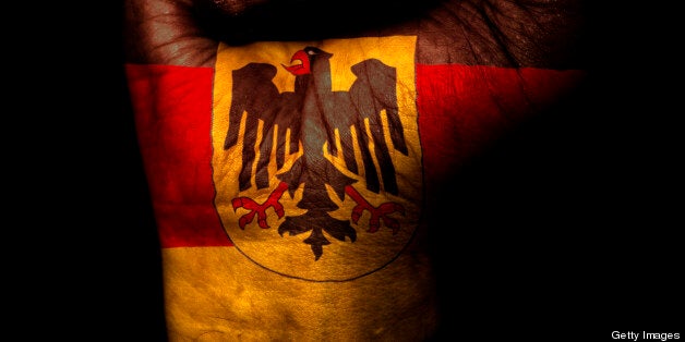 A clenched fist with the flag of Germany (Eagle Version) on it