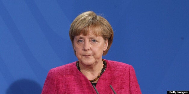BERLIN, GERMANY - APRIL 30: German Chancellor Angela Merkel speaks to the media with new Italian Prime Minister Enrico Letta