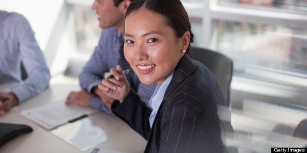 Businesswoman sitting in meeting