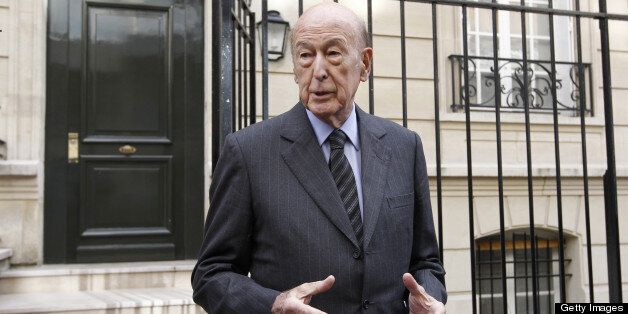 Former French President and former president of the European convention, Valery Giscard d'Estaing answers to journalists' questions in front of his house following the European Union's Nobel Peace Prize on October 12, 2012 in Paris. The Nobel was awarded to the EU, an institution wracked by the euro crisis but credited with bringing more than half a century of peace to a continent ripped apart by two world wars. AFP PHOTO THOMAS SAMSON (Photo credit should read THOMAS SAMSON/AFP/Getty Images)