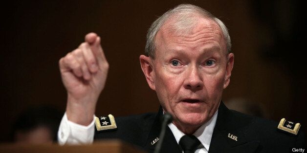 WASHINGTON, DC - JUNE 12: U.S. Chairman of the Joint Chiefs of Staff General Martin Dempsey testifies during a hearing before the Senate Budget Committee June 12, 2013 on Capitol Hill in Washington, DC. The hearing was to examine on President Obama's FY2014 defense budget request, plus topics of discussion including the impact of sequestration and sexual assaults in the military. (Photo by Alex Wong/Getty Images)