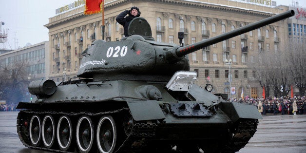 TO GO WITH AFP STORY BY ELEONORE DERMY A World War II-era Red Army's T-34-85 tank rolls during a military parade marking the 70th anniversary of the Stalingrad Battle, in the city of Volgograd, formerly Stalingrad, on February 2, 2013. Russia marked today the 70th anniversary of a brutal battle in which the Red Army defeated Nazi forces and changed the course of World War II. The pulverised city was renamed Volgograd in 1961 after Soviet leaders admitted the extent of Stalin's tyranny during his decades in power.AFP PHOTO / MIKHAIL MORDASOV (Photo credit should read MIKHAIL MORDASOV/AFP/Getty Images)