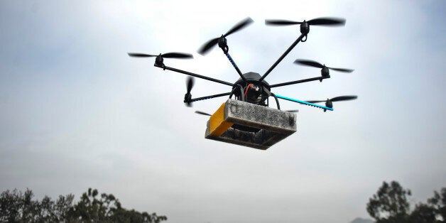 A drone (unmanned vehicle) flies in Lima on July 10, 2013. This control remote vehicles, popularly known as 'drones', begin to formally sail the skies of Peru with scientific purposes to conduct research in agriculture and archeology. AFP PHOTO / ERNESTO BENAVIDES (Photo credit should read ERNESTO BENAVIDES/AFP/Getty Images)