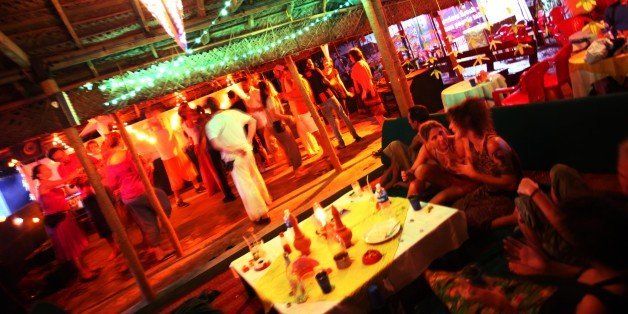 TRIVANDRUM, INDIA - JANUARY 09: Young tourists are dancing at the nightclub disco Funky Art Cafe in Varkala on January 09, 2010 in Varkala near Trivandrum, Kerala, India. (Photo by EyesWideOpen/Getty Images)