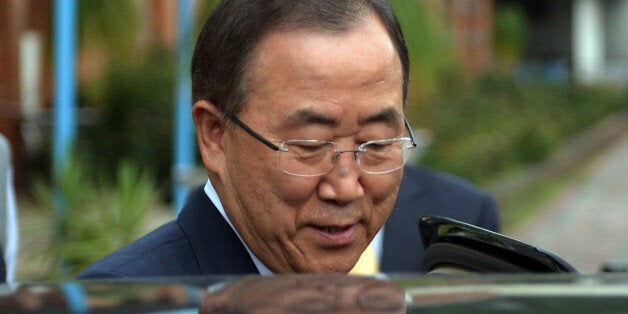 UN Secretary-General Ban Ki-moon leaves the Islamabad College for Girls in Islamabad on August 13, 2013. UN chief Ban Ki-moon arrived in Islamabad on August 13 for a two-day visit as tensions remain high between nuclear-armed neighbours Pakistan and India over the disputed territory of Kashmir. AFP PHOTO / AAMIR QURESHI (Photo credit should read AAMIR QURESHI/AFP/Getty Images)