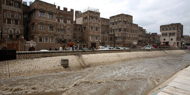 A canal is flooded following heavy rains in the old city of Sanaa on April 9, 2012 as the authorities warn citizens residing in mountainous areas to take necessary precautions against expected flash floods. AFP PHOTO/MOHAMMED HUWAIS (Photo credit should read MOHAMMED HUWAIS/AFP/Getty Images)