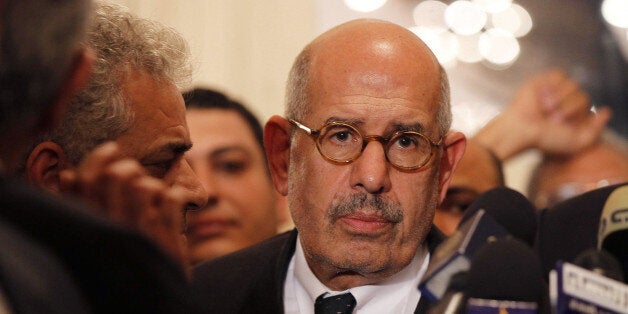 Egyptian opposition leader and Nobel Prize laureate Mohamed ElBaradei leaves at the end of a joint press conference on Novemb