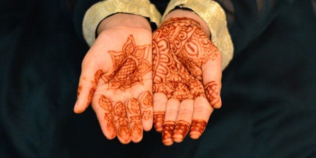 Girl displaying her Mehndi (henna) on occasion of Islamic festival of Eid-ul-Fitr, celebrated after Holy month of Ramazan.