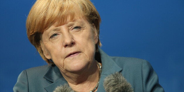 POTSDAM, GERMANY - SEPTEMBER 16: German Chancellor and Chairwoman of the German Christian Democrats (CDU) Angela Merkel speaks at a CDU election rally on September 16, 2013 in Potsdam, Germany. Germany faces federal elections on September 22 and so far the CDU has a strong lead in polls over the opposition. (Photo by Sean Gallup/Getty Images)