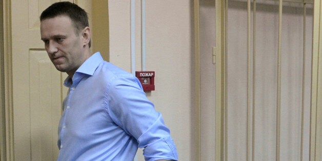 Russian protest leader Alexei Navalny arrives in court for a hearing of his case in the provincial northern city of Kirov on