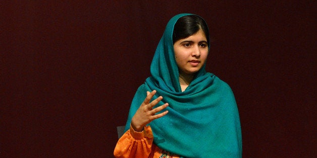 BOSTON, MA - OCTOBER 12: (L-R) WBUR's Robin Young and Malala Yousafzai attend 'A Conversation With Malala Yousafzai' presented by the Kennedy Library Forum at Boston College High School on October 12, 2013 in Boston, Massachusetts. (Photo by Paul Marotta/Getty Images)