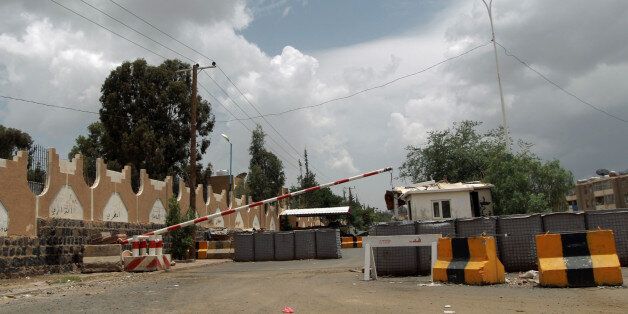 A checkpoint leading to the US embassy compound in the Yemeni capital Saana is seen on August 3, 2013. The United States issued a worldwide warning that Al-Qaeda may attack in August as it ordered shut its embassies across the Islamic world. Britain also said it would temporarily close its embassy in Yemen as US lawmakers said the threat likely involved Al-Qaeda's franchise in the country. AFP PHOTO/ MOHAMMED HUWAIS (Photo credit should read MOHAMMED HUWAIS/AFP/Getty Images)