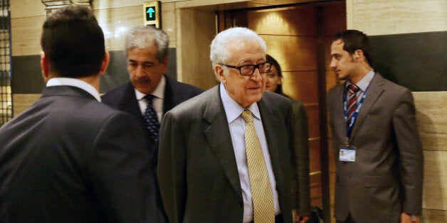 UN-Arab League envoy to Syria Lakhdar Brahimi leaves the Sheraton hotel on October 30, 2013 in Damascus. Brahimi is expected